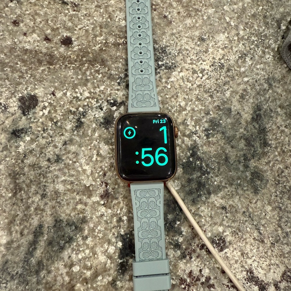 Apple Watch with Light Blue Coach Band